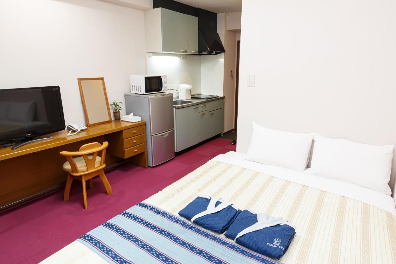 Hotel Peace Land Kume Naha Extérieur photo