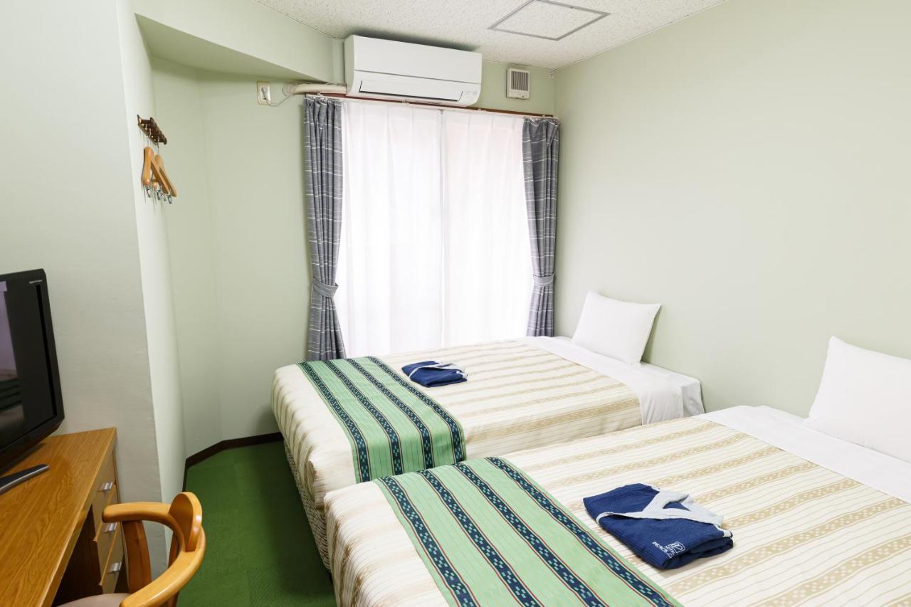 Hotel Peace Land Kume Naha Extérieur photo