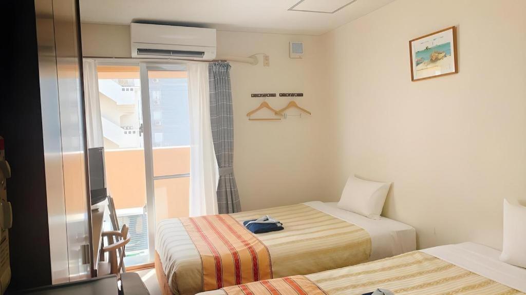 Hotel Peace Land Kume Naha Extérieur photo