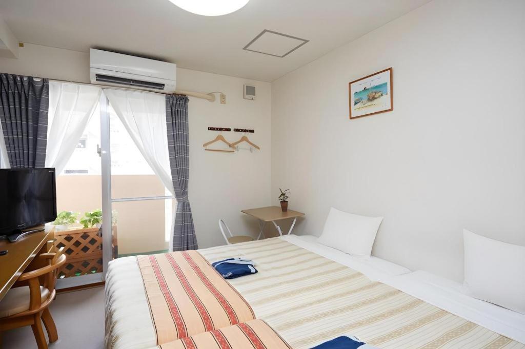 Hotel Peace Land Kume Naha Extérieur photo
