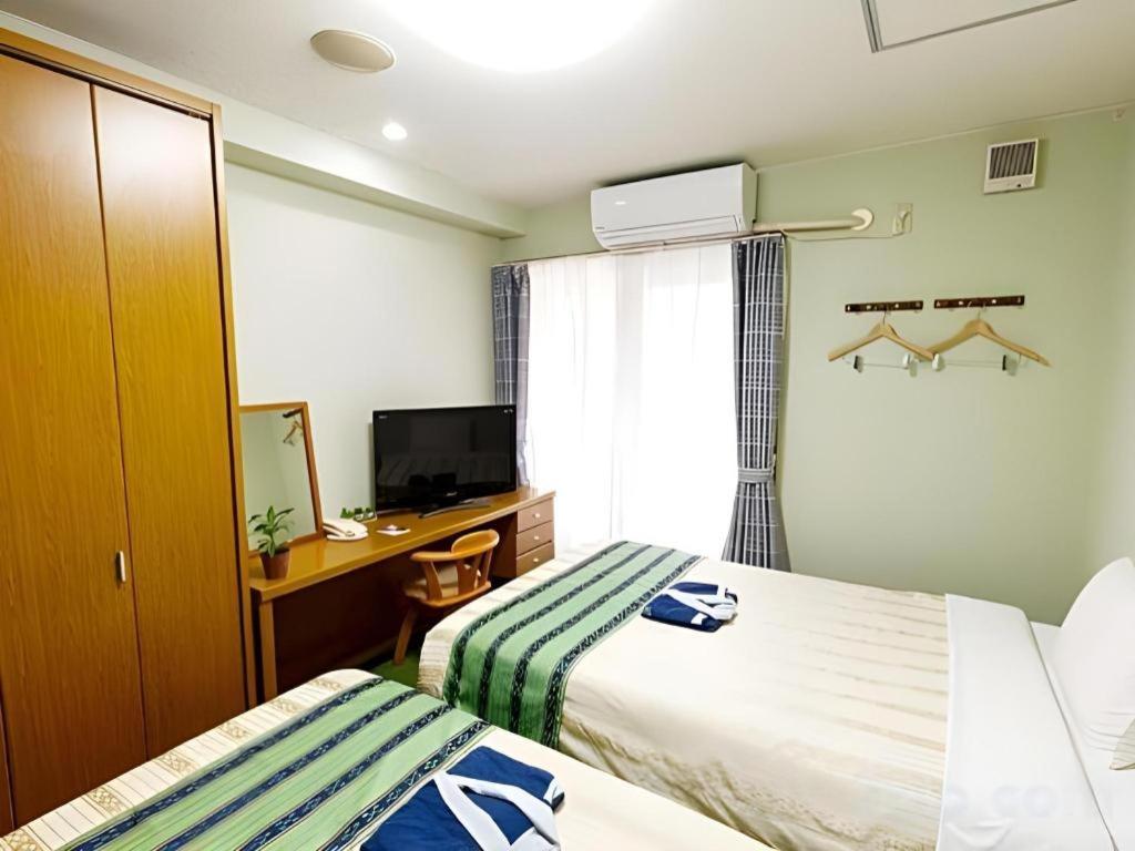 Hotel Peace Land Kume Naha Extérieur photo