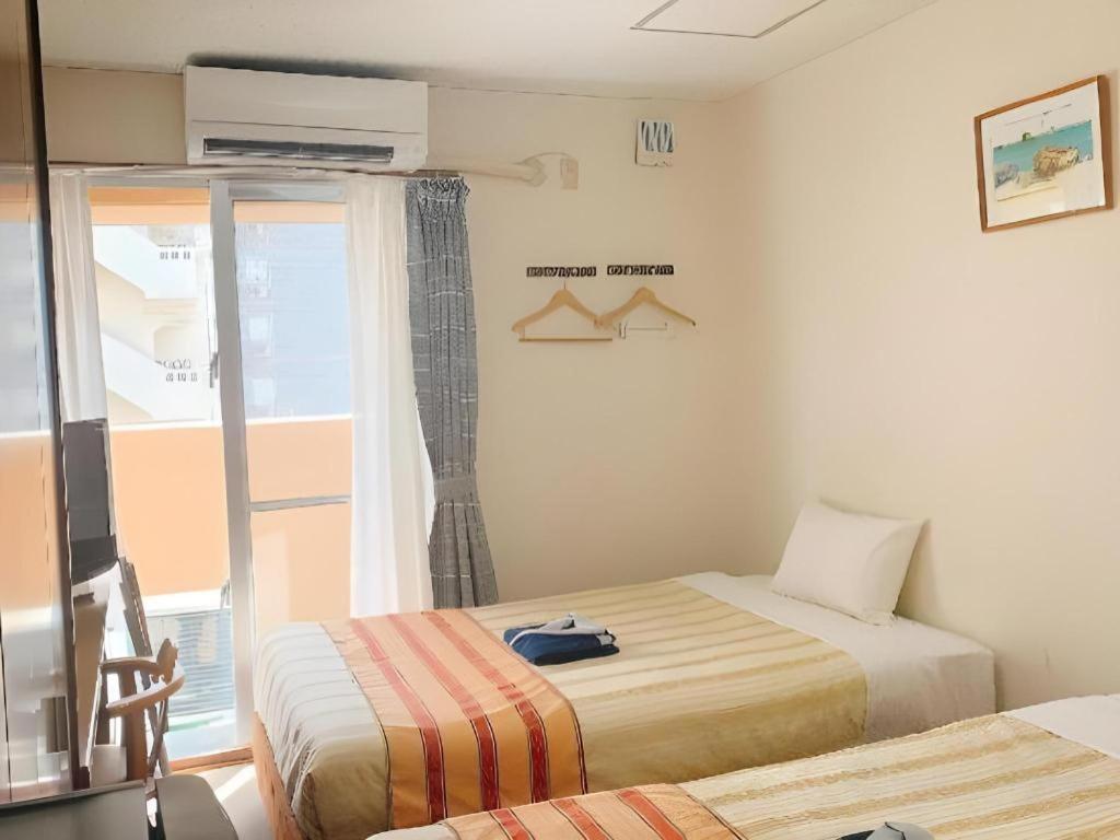 Hotel Peace Land Kume Naha Extérieur photo