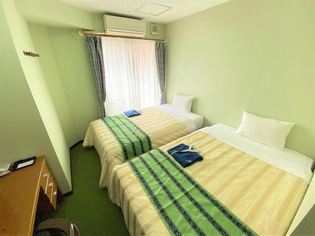 Hotel Peace Land Kume Naha Extérieur photo