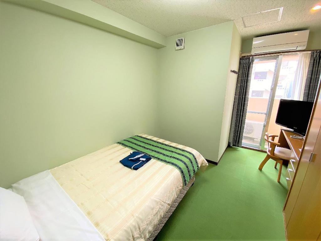 Hotel Peace Land Kume Naha Extérieur photo